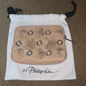 Used once! 3.1 Phillip Lim Clutch comes w/ Duster